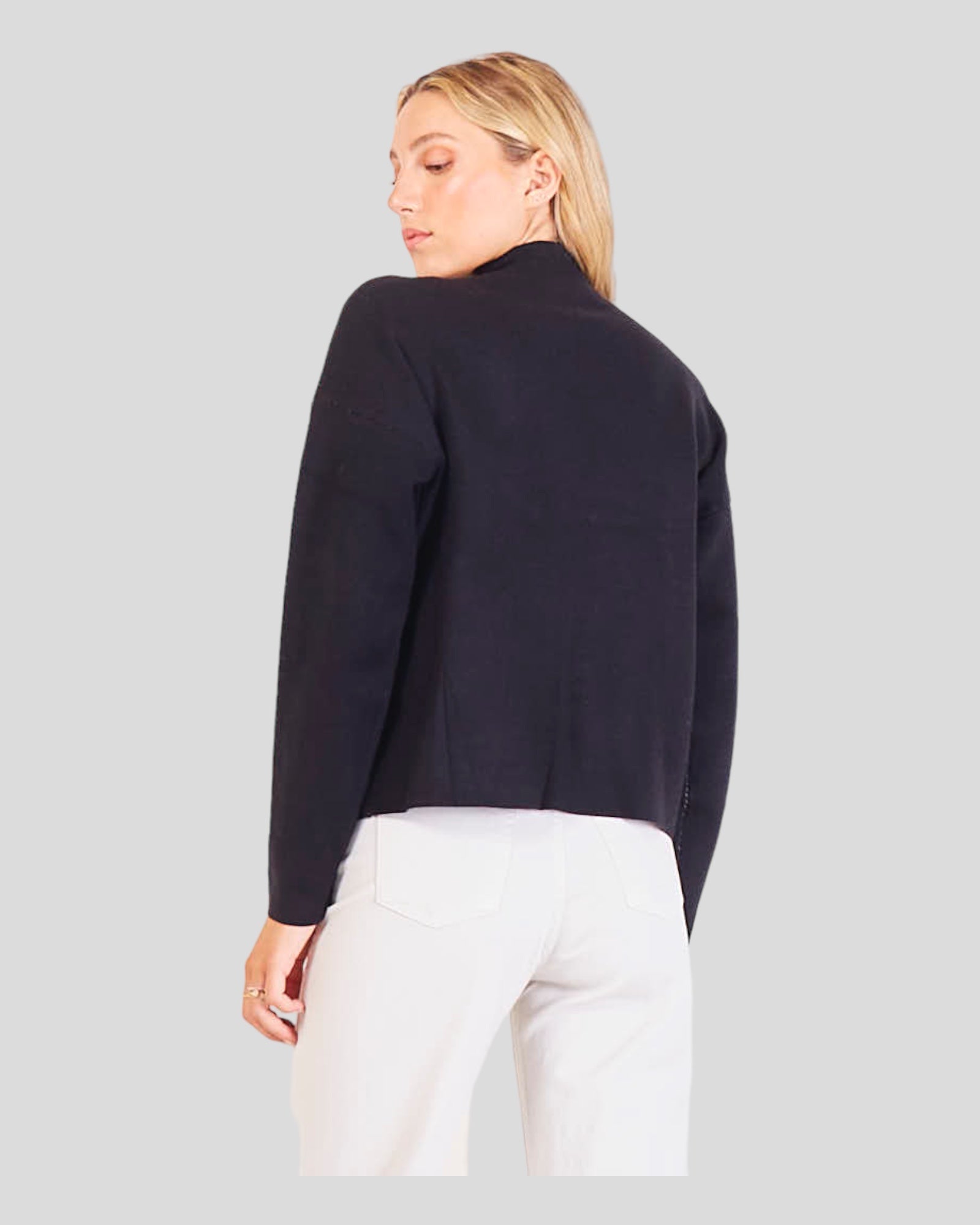 Sporty Sweater designed for dynamic style and chic comfort. Featuring large 'Amor' writing on the front, this sweater makes a bold statement. The slightly high collar adds a modern twist while ensuring coziness. 