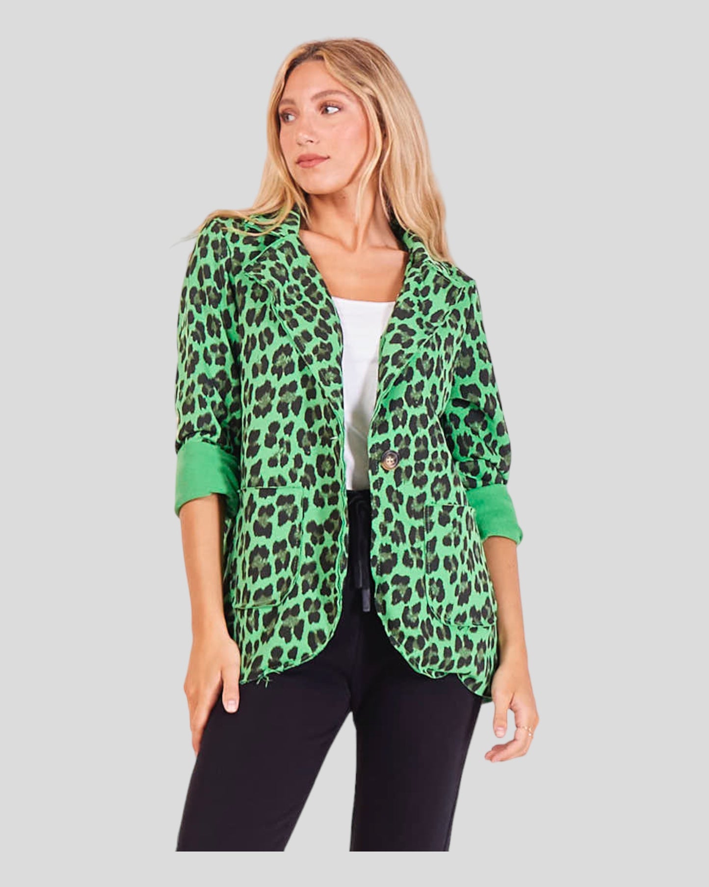 Animal Print Blazer crafted from lightweight cotton, offering both comfort and elegance. The blazer features a unique animal print design, making a bold and stylish statement. With a practical one-button closure, it effortlessly combines comfort with sophisticated flair. Two large front pockets enhance functionality while adding to the overall chic aesthetic.