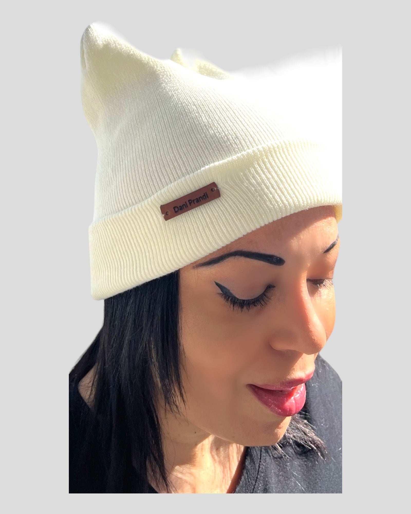 Beanie Hat with Cat Ears, adding playful feline flair to your look. Crafted from comfortable acrylic material, this hat is designed for warmth and style. The cat ears offer a whimsical touch, making it a unique and fashionable accessory.
