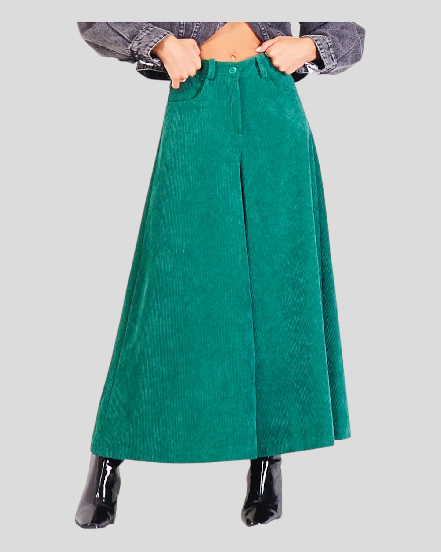 Slightly Short Wide-Leg Trousers in luxurious corduroy velvet, striking a perfect balance between elegance and modern style. The trousers feature a zipper, front closure button, and convenient pockets for both style and functionality. Crafted to be slightly short, these trousers offer a contemporary statement.
