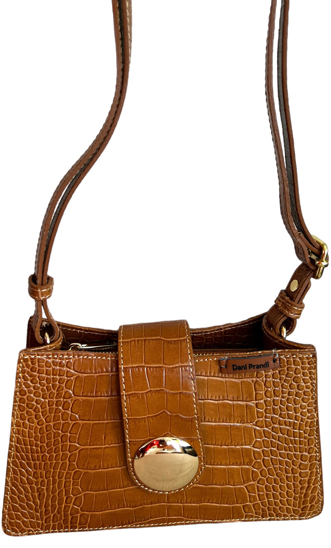 This is a sophisticated genuine leather shoulder bag handbag, a timeless accessory crafted with the finest materials. The bag features a classic design in medium brown, providing both elegance and versatility. With an adjustable shoulder strap and secure zip closure, it seamlessly combines style and practicality.