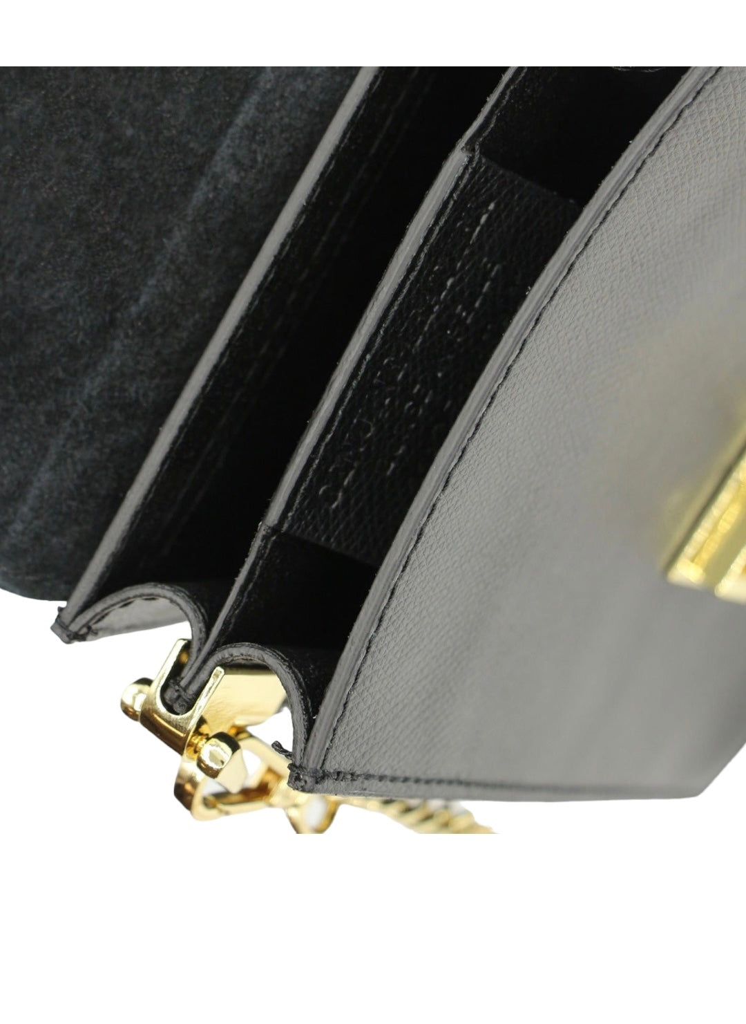 Elegant Evening Bag in black, crafted from real leather and adorned with calf hair for a touch of luxury. The bag showcases timeless sophistication, with a secure button closure and a golden shoulder strap adding a glamorous touch. The dual compartments inside offer practical organization for essentials, making it perfect for important evenings
